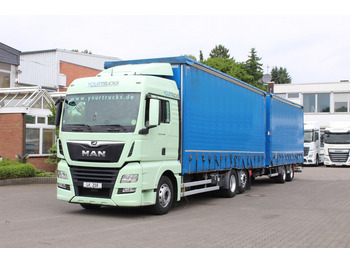 Тентованный грузовик MAN TGX 26.460
