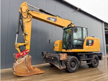 Колёсный экскаватор CATERPILLAR M318F
