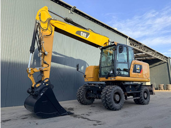 Колёсный экскаватор CATERPILLAR M318F