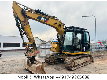 Гусеничный экскаватор CATERPILLAR