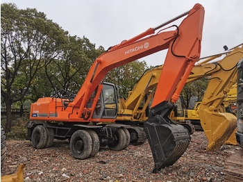 Колёсный экскаватор HITACHI EX160WD