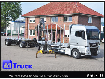 Лесовоз MAN TGX 26.480