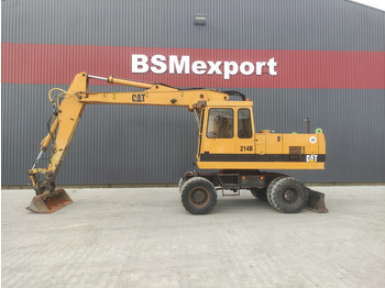 Колёсный экскаватор CATERPILLAR