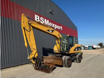 Колёсный экскаватор CATERPILLAR M316C