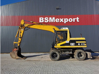 Колёсный экскаватор CATERPILLAR M315