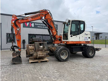 Колёсный экскаватор TEREX