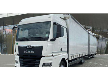Тентованный грузовик MAN TGX 18.470