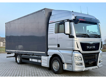 Тентованный грузовик MAN TGX 18.400