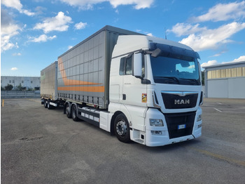 Тентованный грузовик MAN TGX 26.440