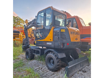 Колёсный экскаватор HYUNDAI