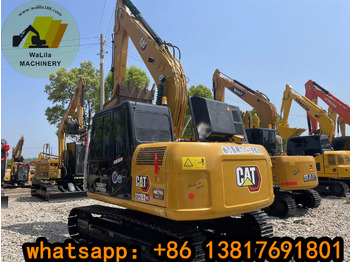 Гусеничный экскаватор CATERPILLAR