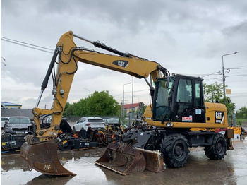 Колёсный экскаватор CATERPILLAR M313D