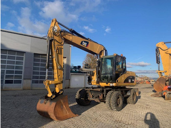 Колёсный экскаватор CATERPILLAR M316D