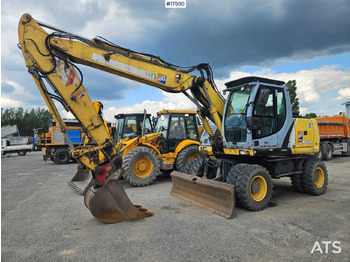 Колёсный экскаватор NEW HOLLAND