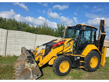 Экскаватор-погрузчик CATERPILLAR