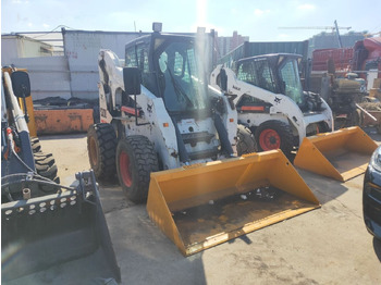 Мини-погрузчик с бортовым поворотом Bobcat S300: фото 5