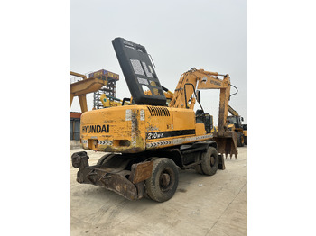 Колёсный экскаватор HYUNDAI R210