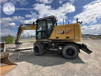Колёсный экскаватор CATERPILLAR M314
