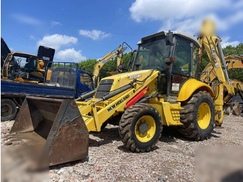 Экскаватор-погрузчик NEW HOLLAND
