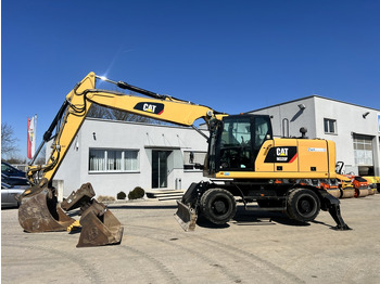 Колёсный экскаватор CATERPILLAR M320F