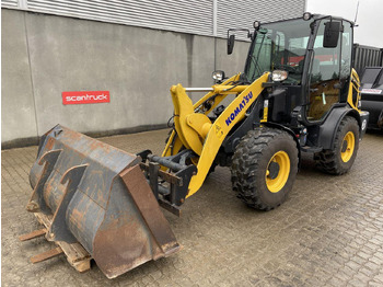 Компактный фронтальный погрузчик