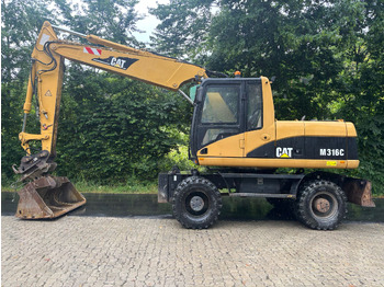Колёсный экскаватор CATERPILLAR M316C