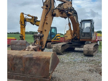 Экскаватор CASE