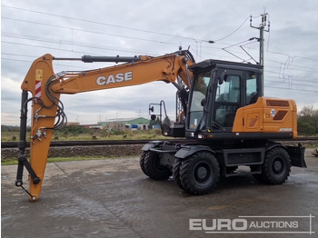 Колёсный экскаватор CASE