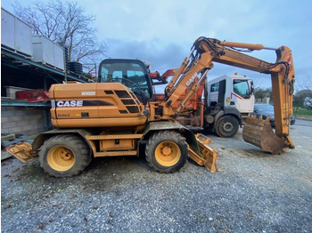 Колёсный экскаватор CASE