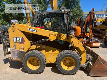 Мини-погрузчик с бортовым поворотом CATERPILLAR