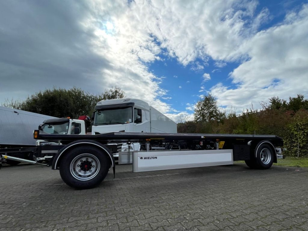Wielton 2-Achs Außenroller-Abrollanhänger - Прицеп мультилифт/ Бункеровоз: фото 2 Wielton 2-Achs Außenroller-Abrollanhänger - Прицеп мультилифт/ Бункеровоз: фото 2