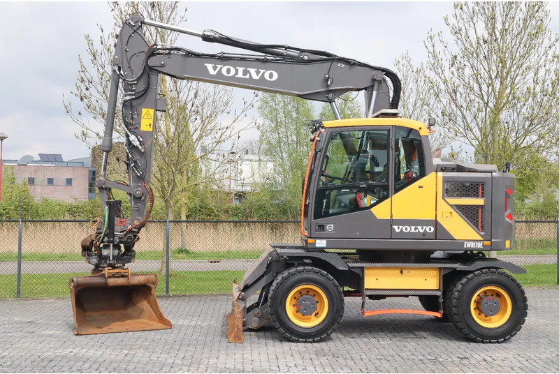 Volvo EWR 170 E | ROTOTILT | BUCKET | DOZERBLADE | TRAILER HYDR - Колёсный экскаватор: фото 1 Volvo EWR 170 E | ROTOTILT | BUCKET | DOZERBLADE | TRAILER HYDR - Колёсный экскаватор: фото 1