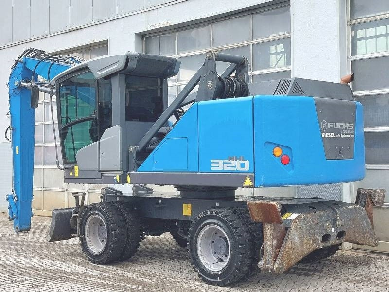 Fuchs MHL 320 F - Перегружатель: фото 3 Fuchs MHL 320 F - Перегружатель: фото 3