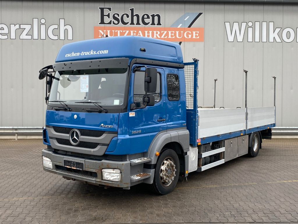 Mercedes-Benz Axor 1829 LL 6,55m Pritsche*6 Sitze*Klima*AHK - Грузовик бортовой/ Платформа: фото 1 Mercedes-Benz Axor 1829 LL 6,55m Pritsche*6 Sitze*Klima*AHK - Грузовик бортовой/ Платформа: фото 1