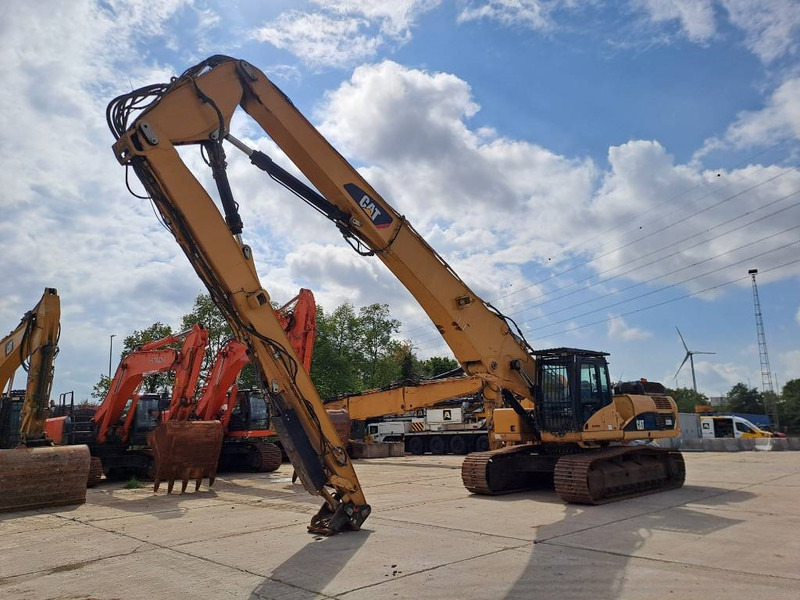 Гусеничный экскаватор Cat 330DL UHD (21m UHD + Short Arm): фото 7