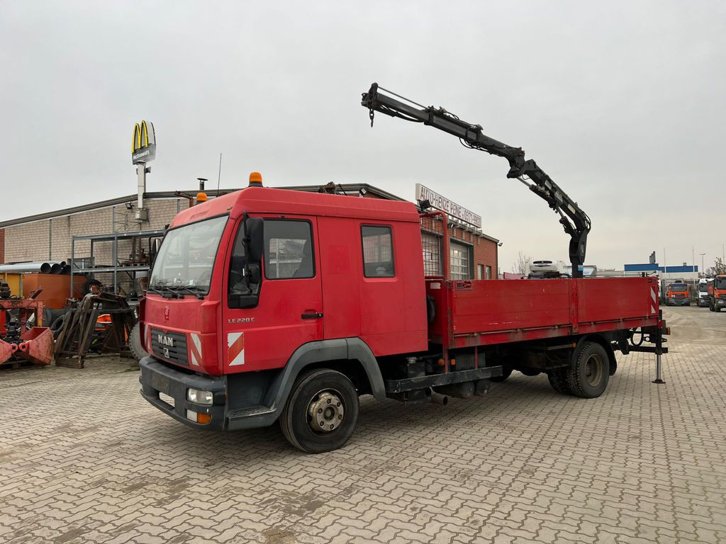 MAN LE 12.225 LC Pritsche Heckkran 6 Zylinder Doka Topzust - Грузовик бортовой/ Платформа, Автоманипулятор: фото 1 MAN LE 12.225 LC Pritsche Heckkran 6 Zylinder Doka Topzust - Грузовик бортовой/ Платформа, Автоманипулятор: фото 1