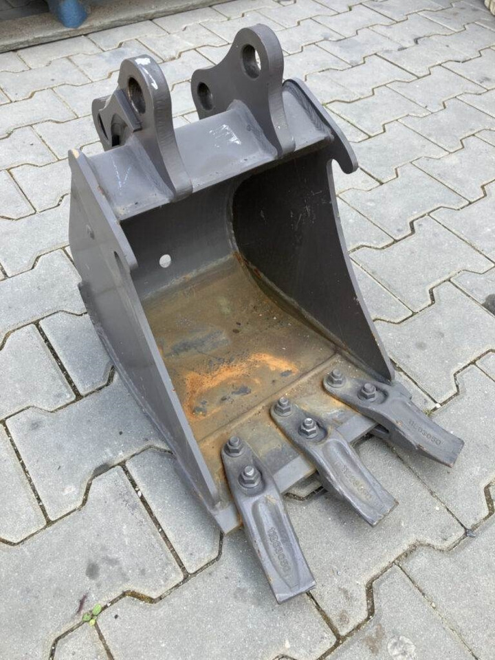 Volvo Tieflöffel mit Zähnen - Festanbau - Экскаватор-погрузчик: фото 1 Volvo Tieflöffel mit Zähnen - Festanbau - Экскаватор-погрузчик: фото 1