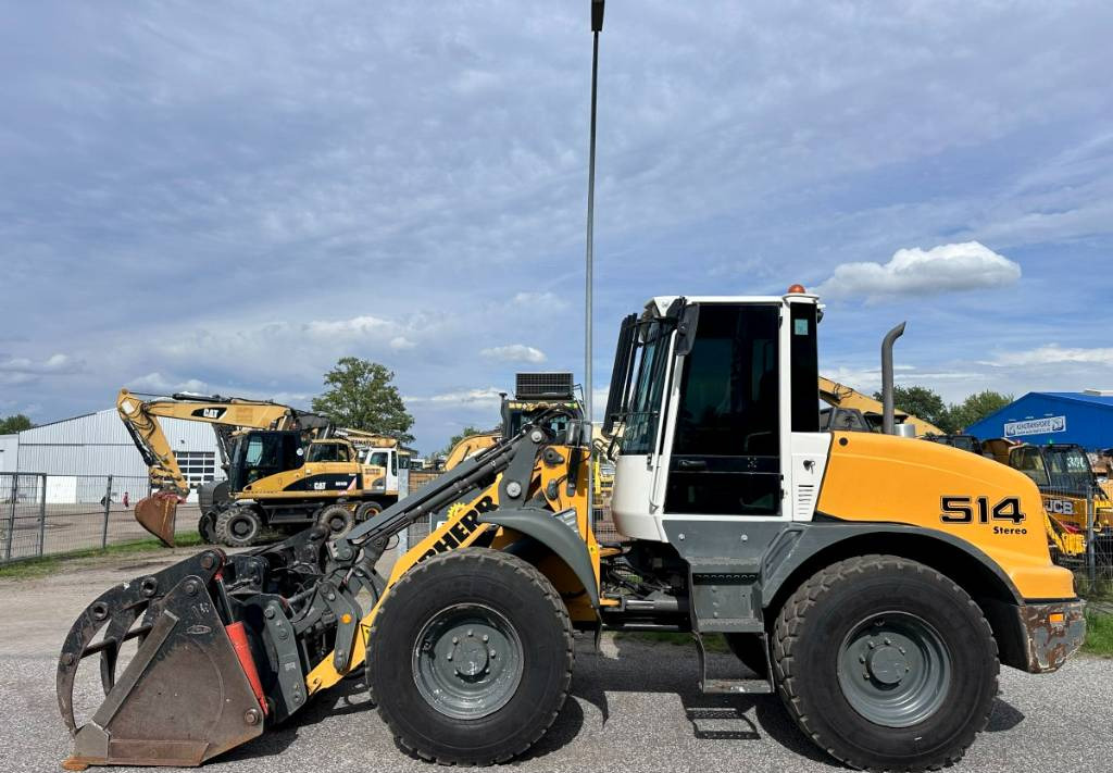 Liebherr L 514 Stereo +30 Kmh Klima 3er Kreis Greifschaufel - Колёсный погрузчик: фото 1 Liebherr L 514 Stereo +30 Kmh Klima 3er Kreis Greifschaufel - Колёсный погрузчик: фото 1