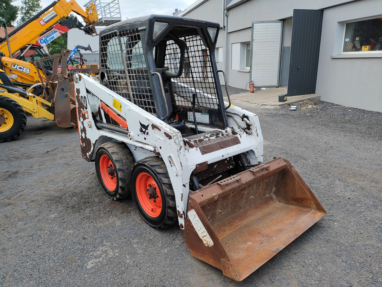 Bob cat s100 - Мини-погрузчик с бортовым поворотом: фото 3 Bob cat s100 - Мини-погрузчик с бортовым поворотом: фото 3