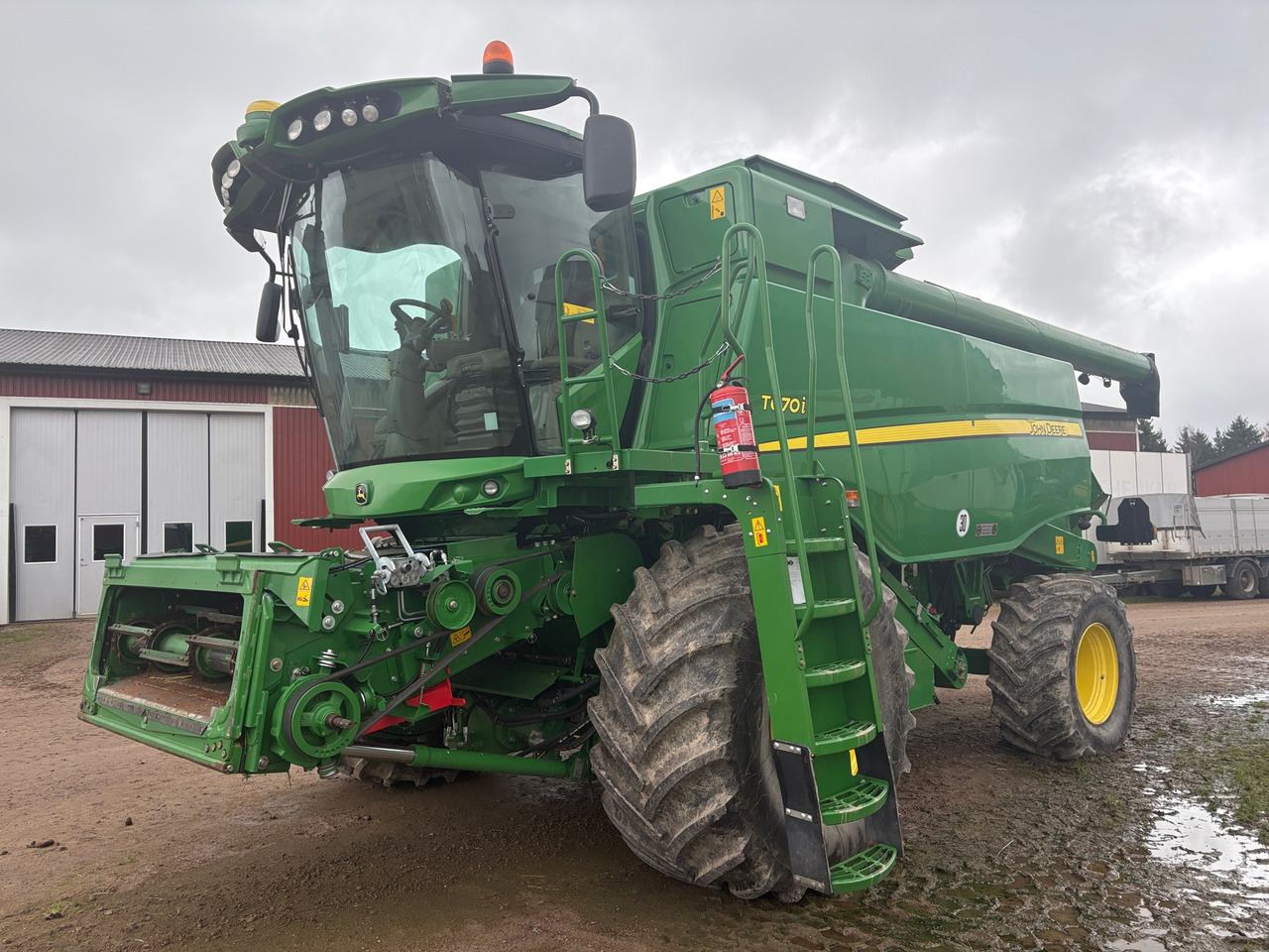 John Deere T670I - Зерноуборочный комбайн: фото 1 John Deere T670I - Зерноуборочный комбайн: фото 1