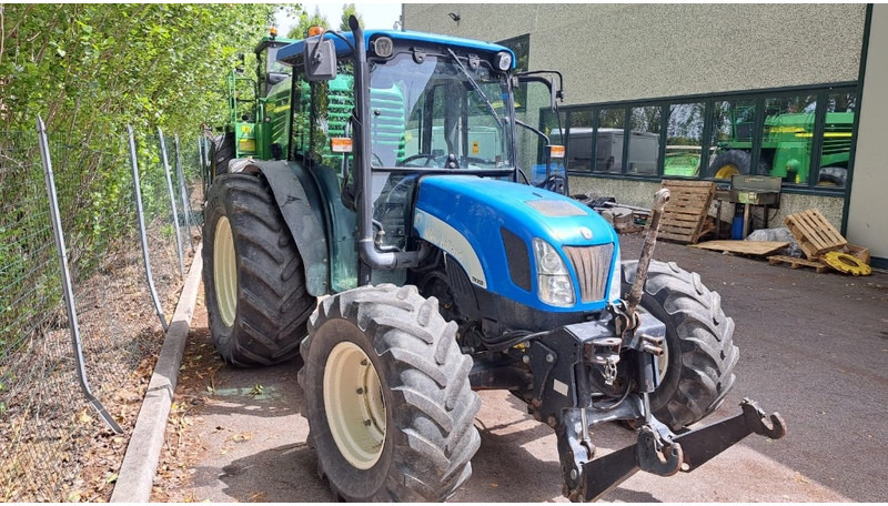 New Holland TN 95 D A - Трактор: фото 1 New Holland TN 95 D A - Трактор: фото 1
