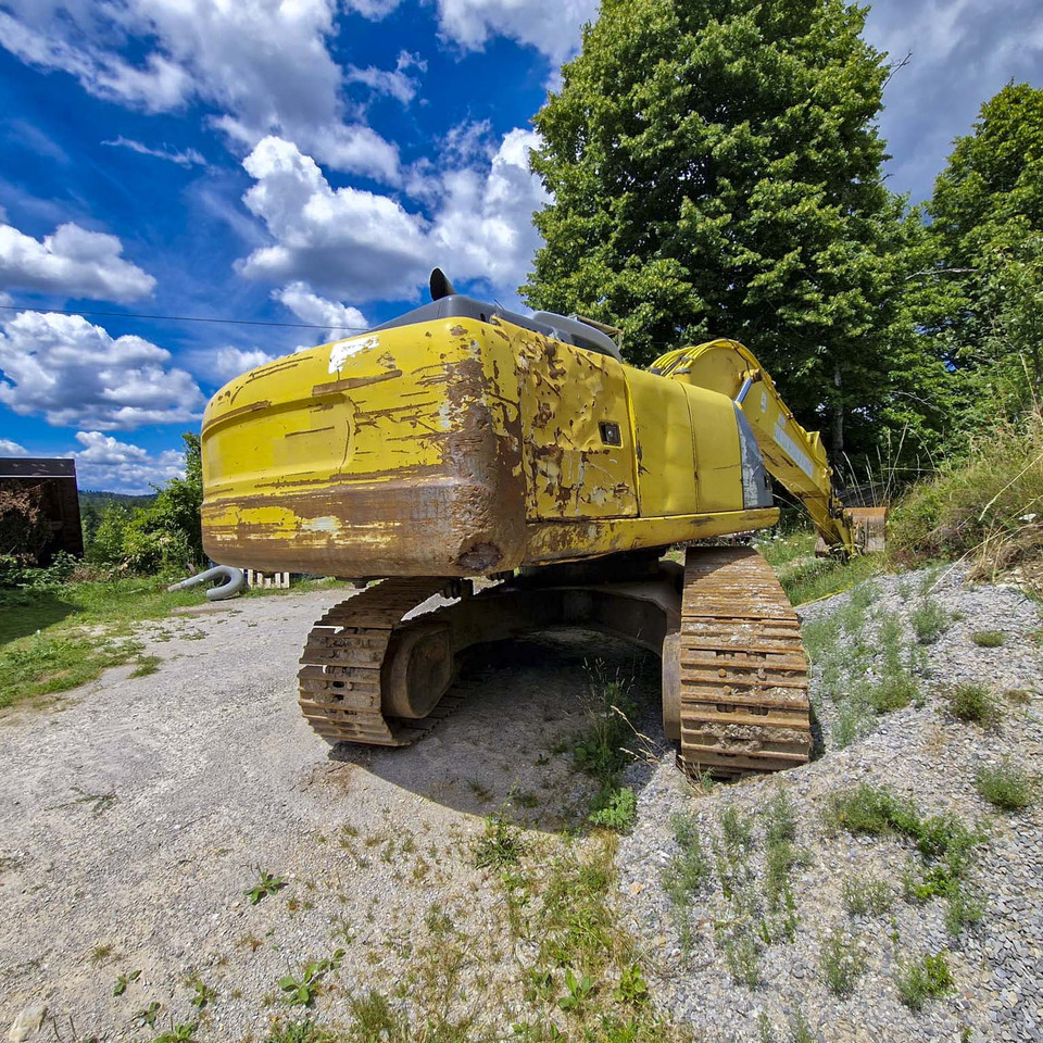 New Holland Kobelco E215 - Гусеничный экскаватор: фото 5 New Holland Kobelco E215 - Гусеничный экскаватор: фото 5