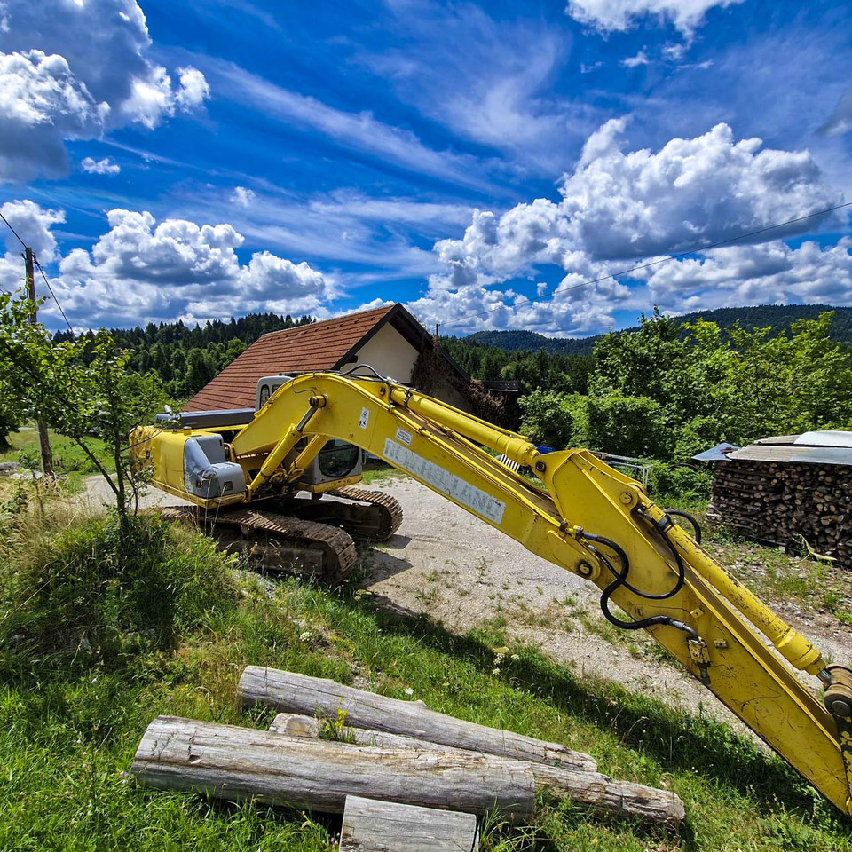 New Holland Kobelco E215 - Гусеничный экскаватор: фото 3 New Holland Kobelco E215 - Гусеничный экскаватор: фото 3