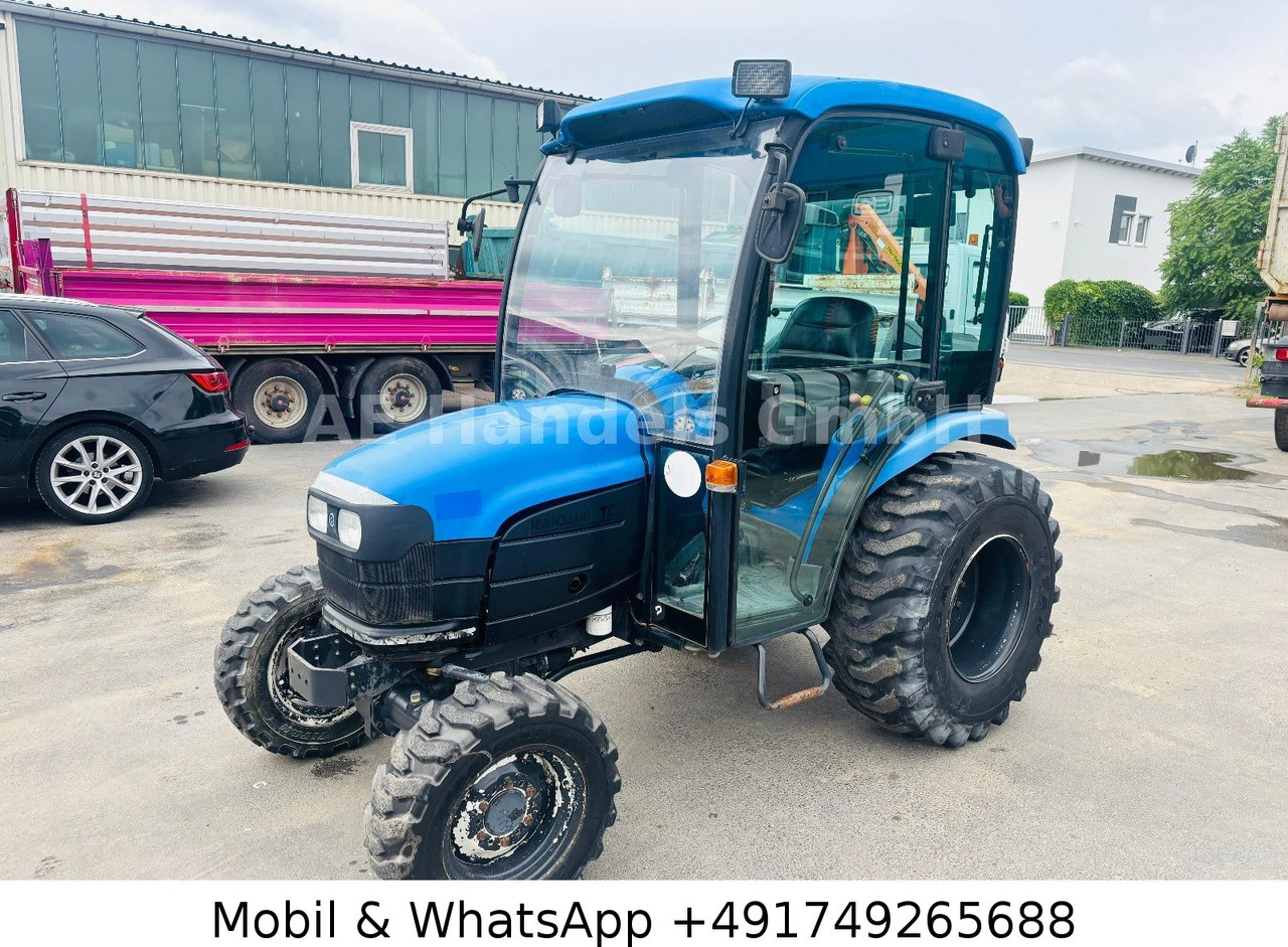 New Holland TC22D Compact Tractor *1500Std./StraßenZulassung - Трактор: фото 1 New Holland TC22D Compact Tractor *1500Std./StraßenZulassung - Трактор: фото 1