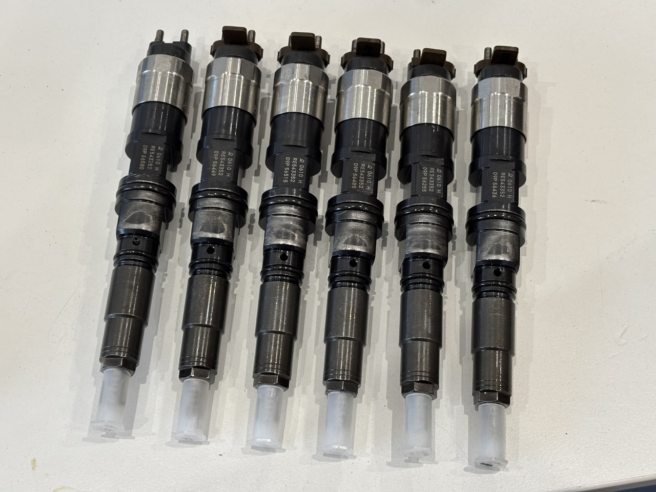 John Deere 9.0L HPCR RE543352 Wtryskiwacz Wtryskiwacze 095000-0610 RE543605 0610 PO REGENERACJI - Распределитель впрыска для Сельскохозяйственной техники: фото 1 John Deere 9.0L HPCR RE543352 Wtryskiwacz Wtryskiwacze 095000-0610 RE543605 0610 PO REGENERACJI - Распределитель впрыска для Сельскохозяйственной техники: фото 1