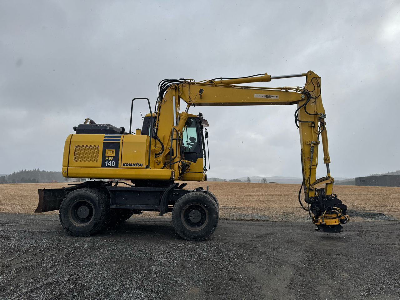 KOMATSU PW 140-7 - Колёсный экскаватор: фото 1 KOMATSU PW 140-7 - Колёсный экскаватор: фото 1