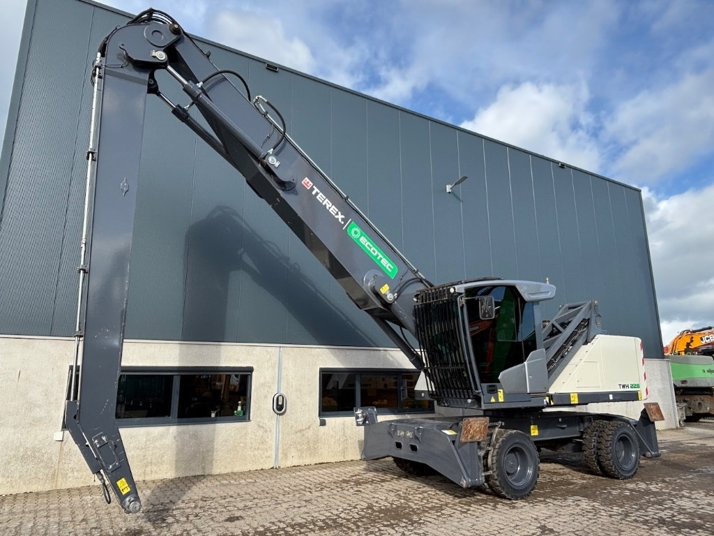 Fuchs MHL 340 F - MHL340 Terex Ecotec TWH228 - Перегружатель: фото 4 Fuchs MHL 340 F - MHL340 Terex Ecotec TWH228 - Перегружатель: фото 4