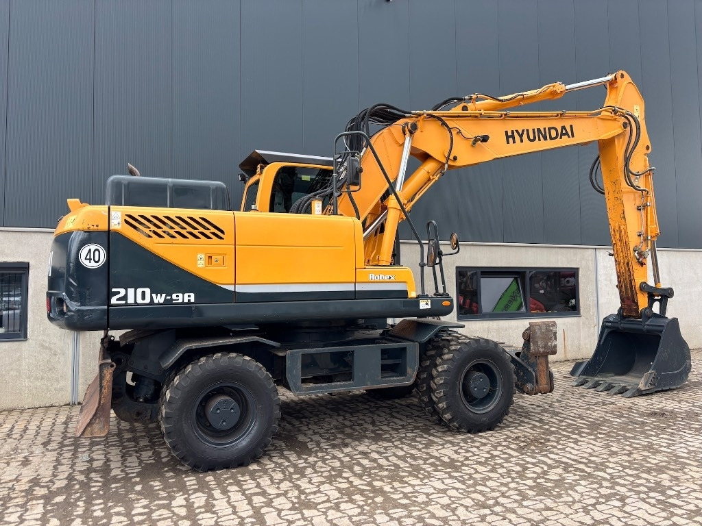 Hyundai Robex 210 W-9 A - 210 W - 200 W - 180 W - Колёсный экскаватор: фото 5 Hyundai Robex 210 W-9 A - 210 W - 200 W - 180 W - Колёсный экскаватор: фото 5