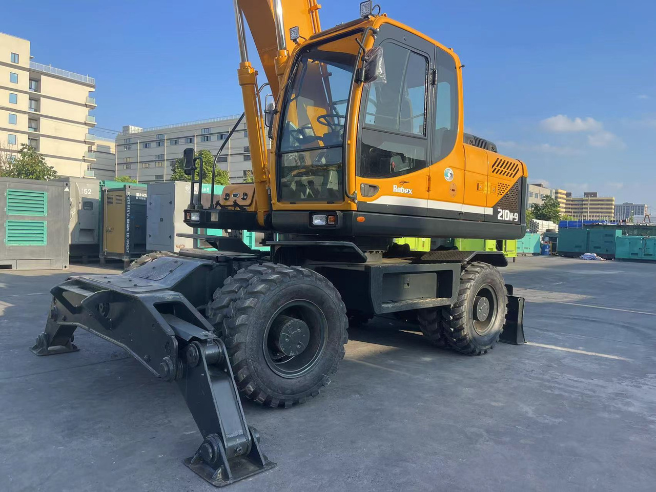 Hyundai R210W-9 - Колёсный экскаватор: фото 1 Hyundai R210W-9 - Колёсный экскаватор: фото 1