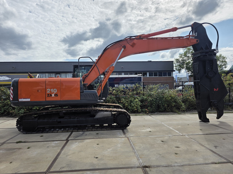 Hitachi zx210 scrap shear verachtert genesis labounty italmek sennebogen liebherr - Перегружатель: фото 1 Hitachi zx210 scrap shear verachtert genesis labounty italmek sennebogen liebherr - Перегружатель: фото 1